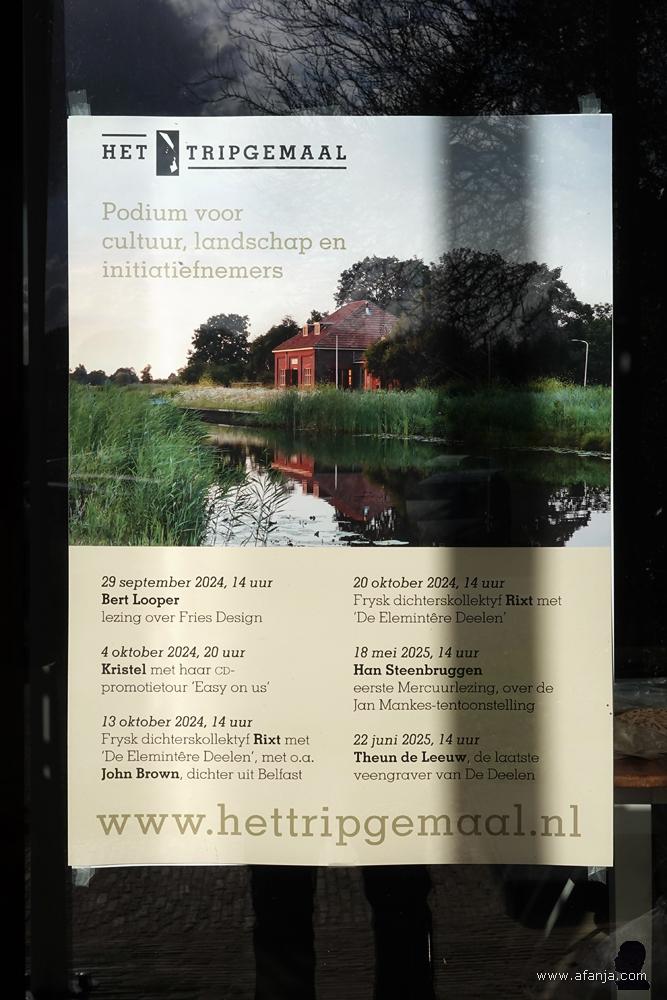 affiche op een deur van het Tripgemaal