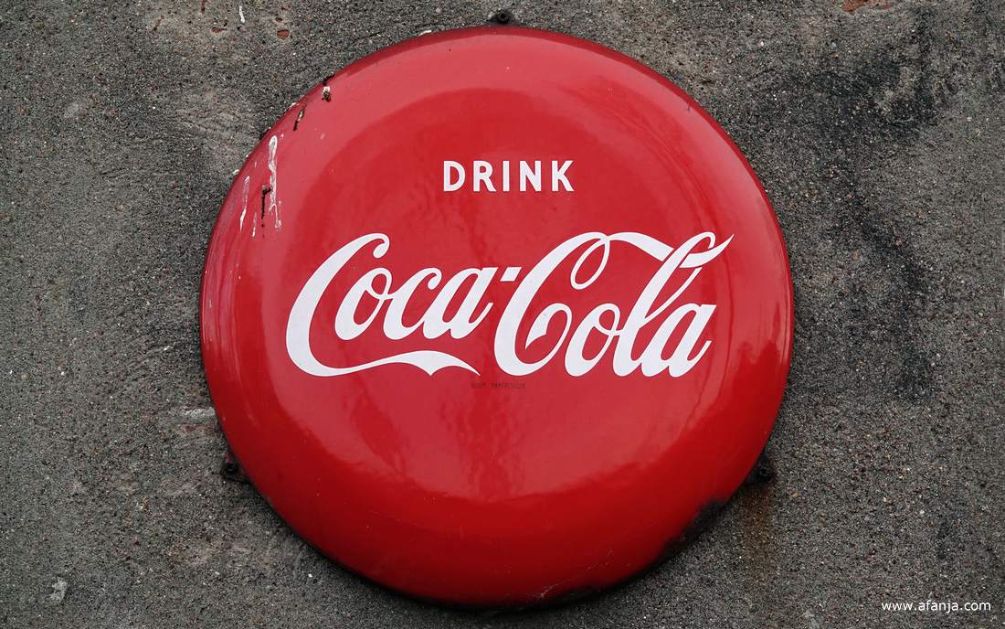 reclamebord voor Coca-Cola op de zijgevel