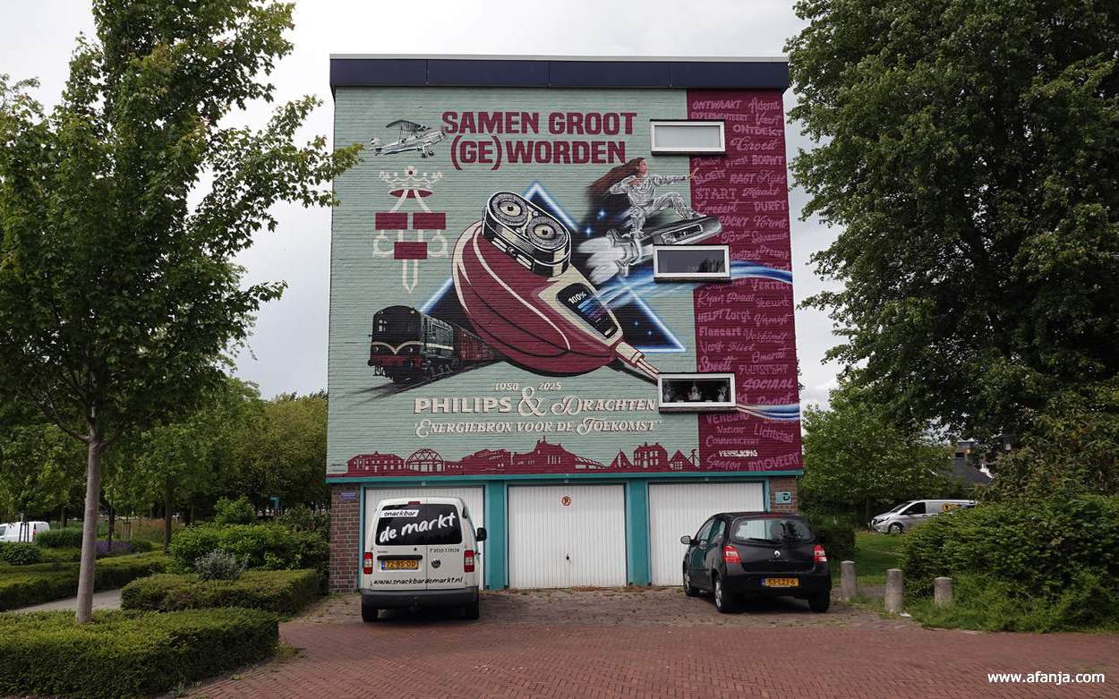 muurschildering aan de Markt over 75 jaar Philips en Drachten